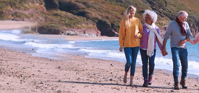 Family Walking on a Beach